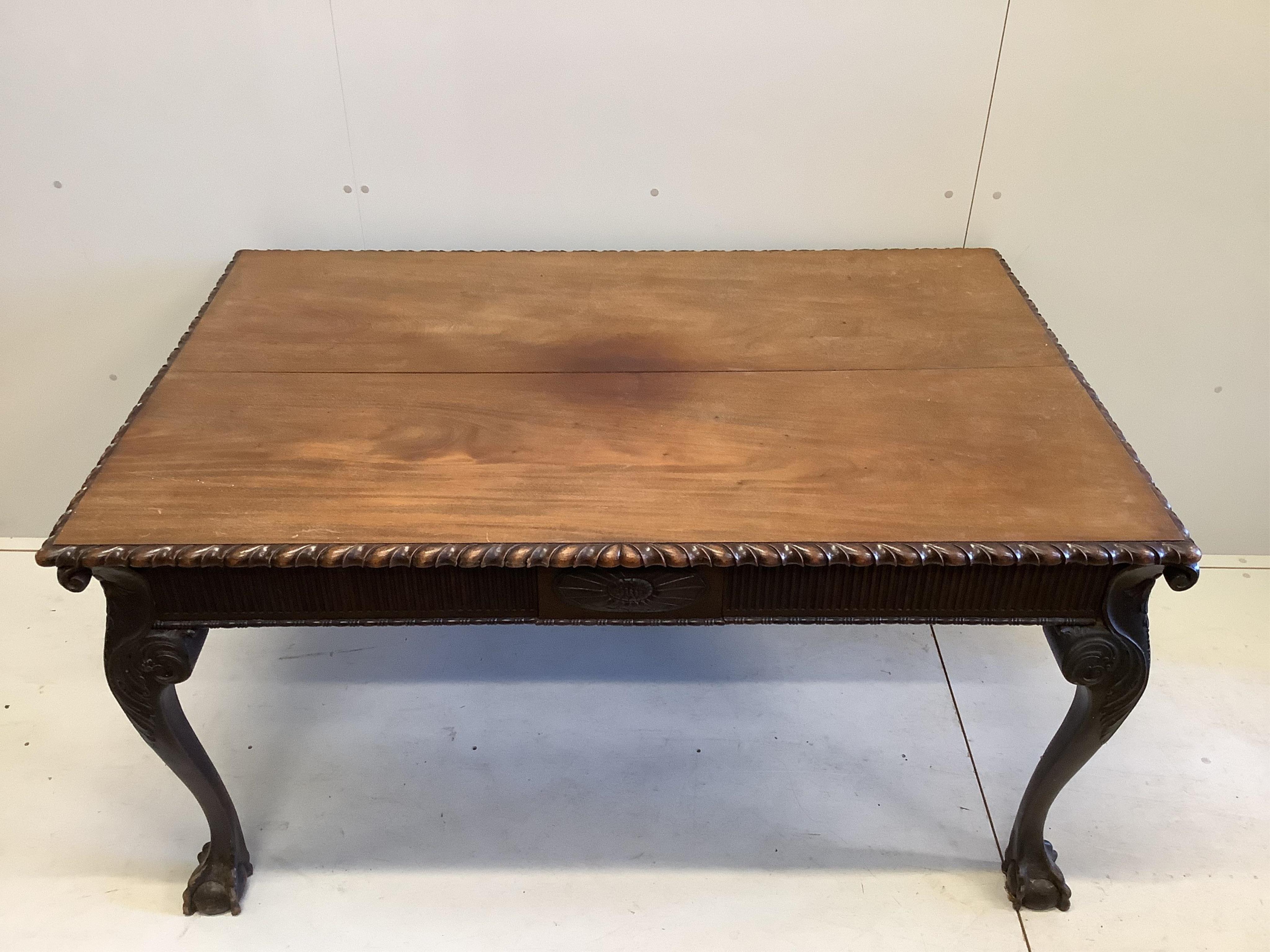 A Chippendale Revival rectangular mahogany table, width 152cm, depth 96cm, height 78cm and four chairs. Condition - fair